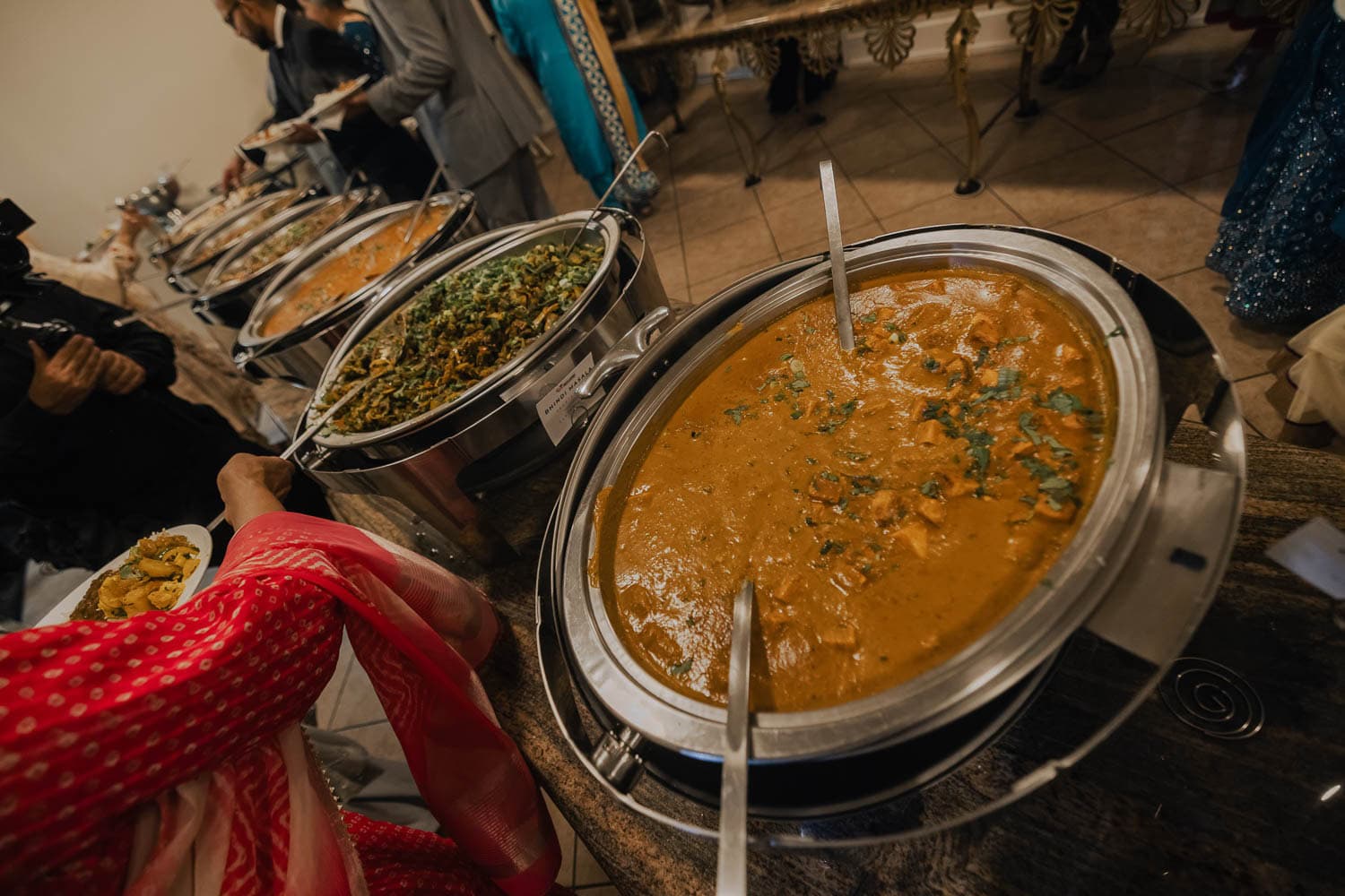 Elegant buffet with diverse dishes at Paradise Ballrooms.