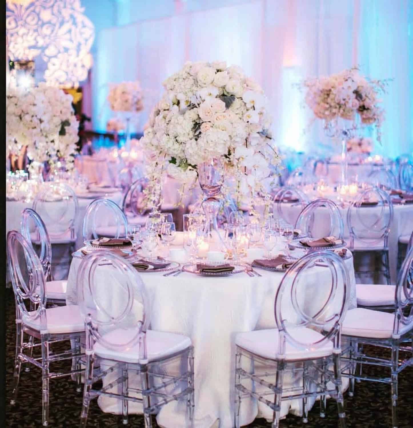 Elegant wedding reception setup with floral centerpieces and sophisticated decor at Paradise Ballroo.
